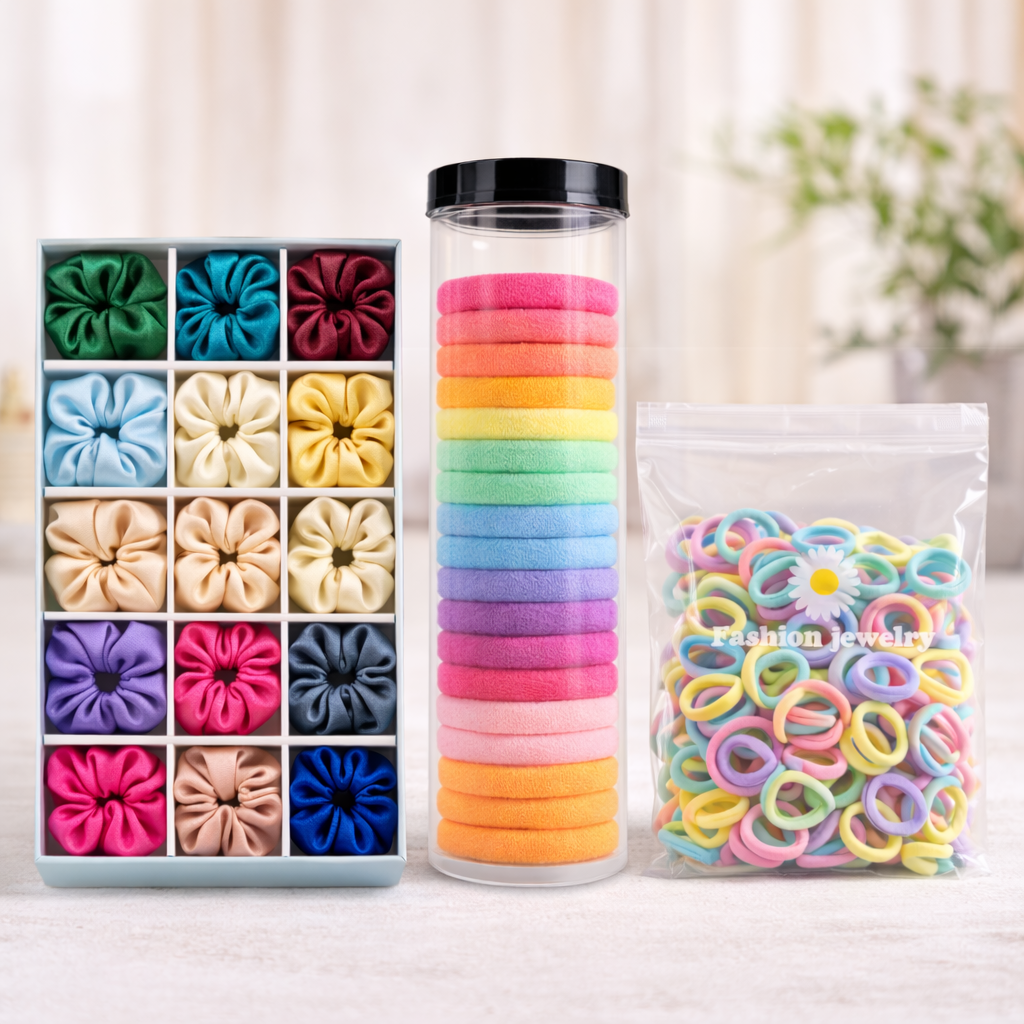 Assorted colorful hair ties in a box, tube, and bag on a light background
