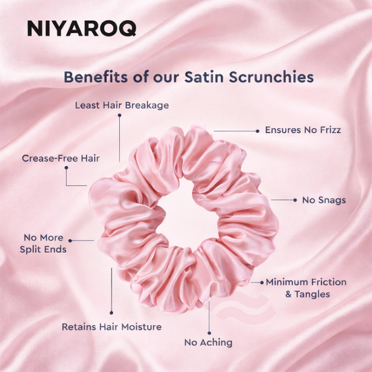 Close-up of the NIYAROQ satin scrunchie showing the smooth, soft fabric texture